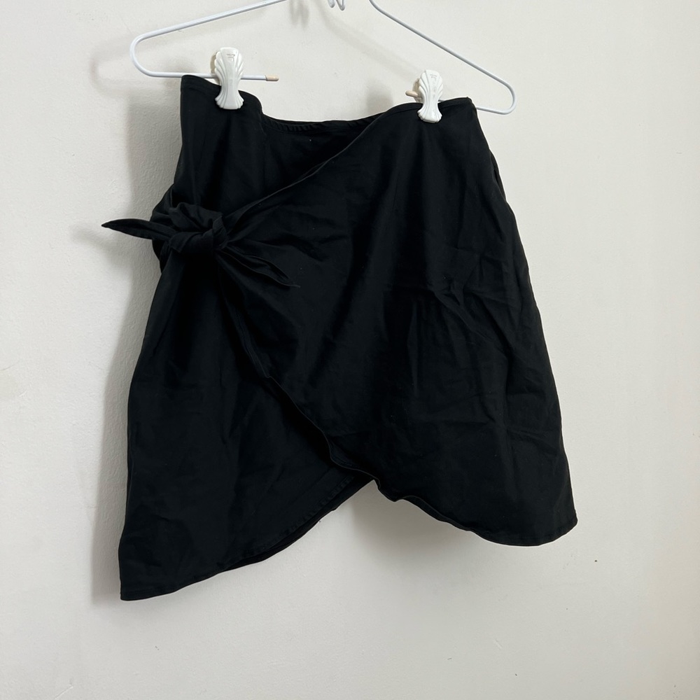 Black Gucci mini wrap skirt